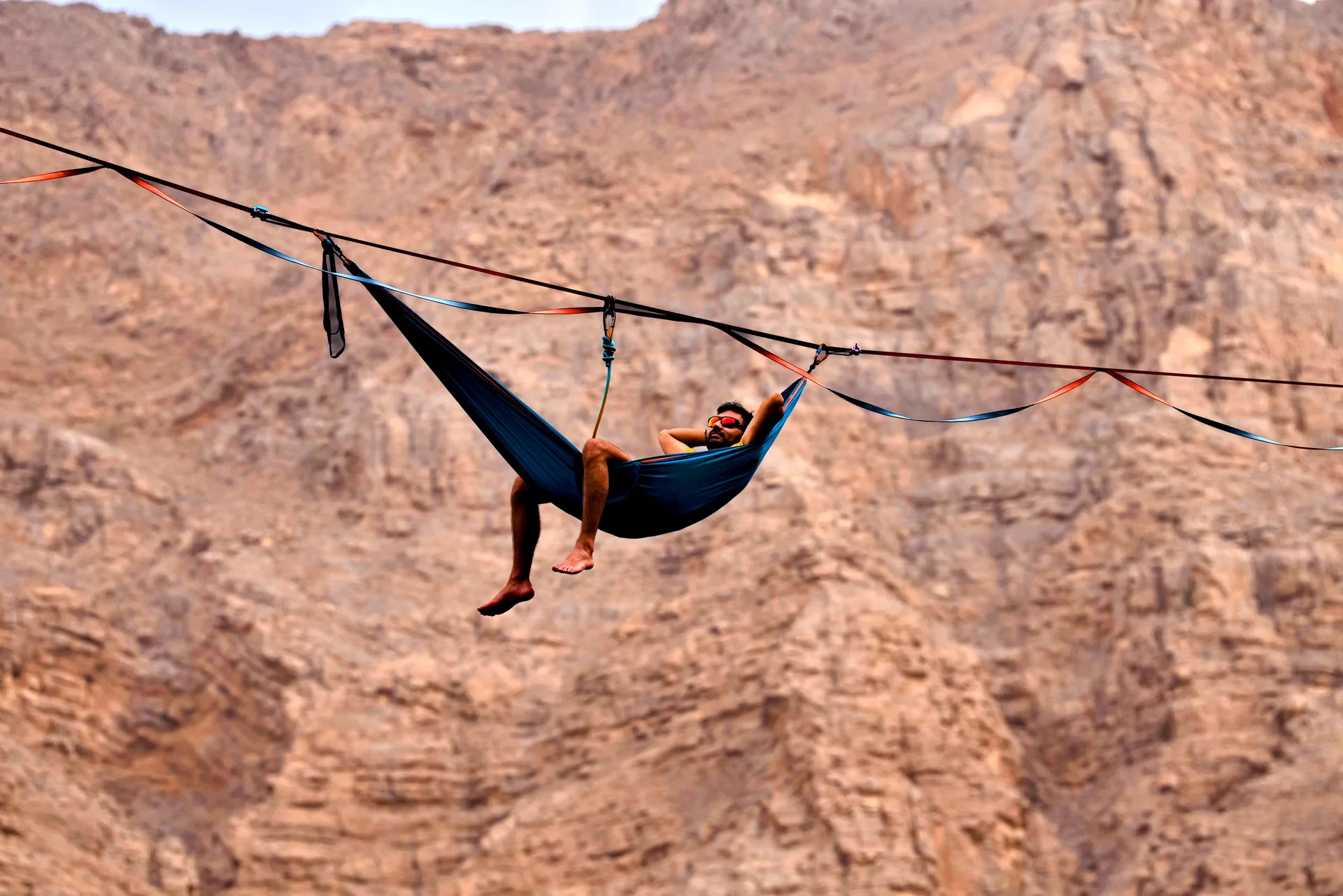Apurv in a hammock on a slackline